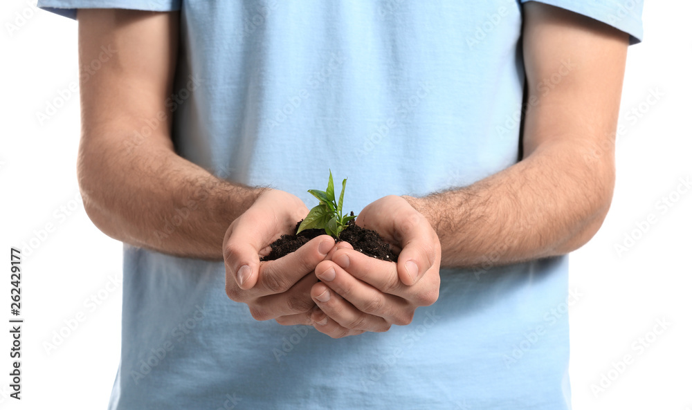 Man with young plant on white background, closeup