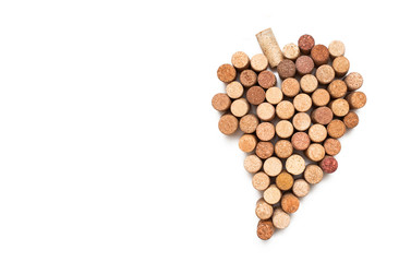 Bunch of grapes from wine corks on a white background