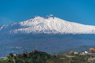 Wall Mural - View of Snow Capped Mt. Etna at Sunset from Sicily, Italy