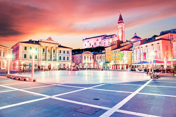 Wall Mural - beautiful amazing city scenery in the central square with the old clock tower in piran, the tourist 