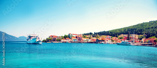 Beautiful scenic landscape with bay and ferry in Nydri, Lefkada, Greece. Stun...