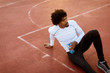 © BGStock72 - Close up of attractive black man sitting on the court