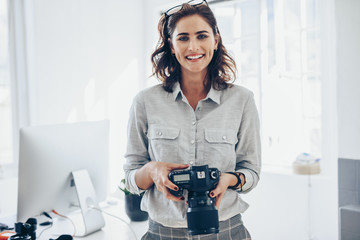 Attractive young woman photographer