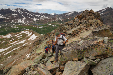 Wall Mural - some mountaineers climb the ridge of punta violetta, in the gran paradiso park, in italy.