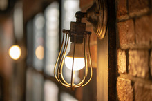 Antique Electronic Lamp, Hang At The Red Brick Wall In The Restaurant.soft Focus.