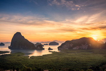 Wall Mural - Landscape of limestone karsts in Phang nga bay at sunrise. Unseen place of 