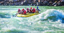 White Water River Rafting In Rishikesh, India. Sports Activity By Group Of Tourist.