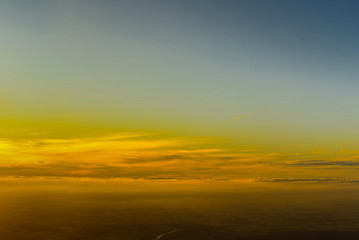 landscape sunrise or sunset from the window of the plane