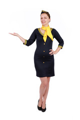 Wall Mural - Stewardesse - Charming and smiling Stewardess Dressed In Blue Uniform Holding In Hand. Isolated on white backgroundv