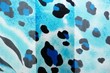 blue motley silk fabric closeup background