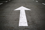 Fototapeta  - Arrow Sign on Asphalt Road