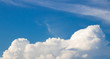 Blue sky and soft white clouds background