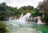 Fototapeta Krajobraz - beautiful waterfall and blue lake in Croatian National Park Krk, a favorite vacation spot