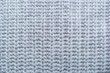 gray knitted fabric closeup knitwear background
