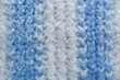 white and blue knitted fabric closeup background