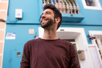 young man laughing and happy