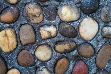 Brown stones on gray background