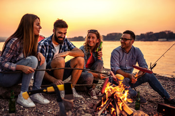 Group of friends have barbecue