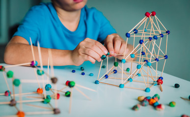 Wall Mural - child making geometric shapes, engineering and STEM