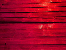 Bright Red Fence. Orange Color Fence Boards.