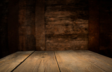 background barrel and worn old table of wood