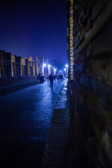 Wall Mural - Verona, Italy – March 2019. Castelvecchio Bridge, Brick & marble bridge with 3 spans & arches, built in the 14th century & reconstructed after WWII. Verona, Italy, Europe