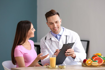 Sticker - Young woman visiting nutritionist in weight loss clinic