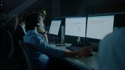 Aufkleber - Late at Night In Modern Office: Row of 24/7 Support People and Salesmen Working at their on Desktop Computers, Using Headsets and Making Calls, Talking to Clients and Customers