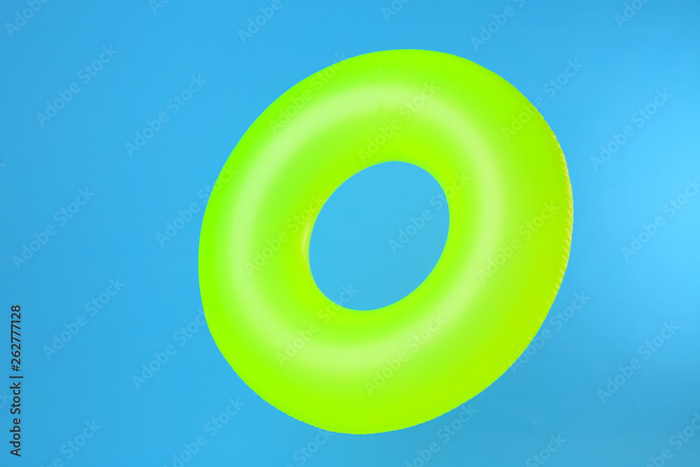 Inflatable ring on color background