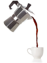 Coffee Poured From A Flying Moka Into A Cup Isolated On White
