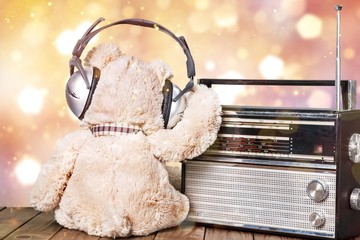 Sticker - Teddy bear in headphones and radio