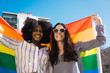 © Luis Mario Hernandez/ADDICTIVE STOCK - Lesbian couple celebrating with LGBT flag on gay pride day