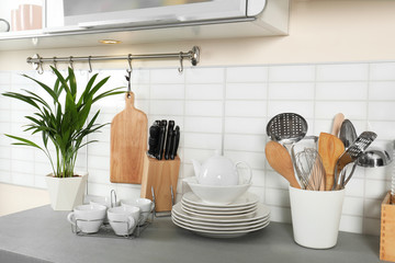 Poster - Clean dishes and utensils on kitchen counter