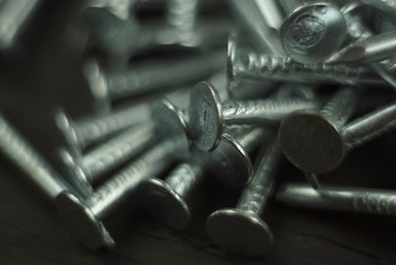 Nails on a black background close up   