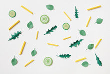 Ingredients For Green Salad With French Fries Are Made From Paper Craft On A White Background