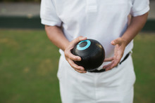 Lawn Bowl And Hands