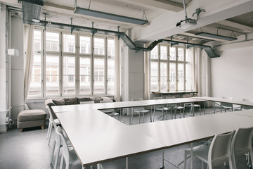Empty Bright White Industrial Conference Room