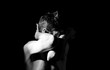 © Serhii  Holdin - dramatic black and white photography, a man holding his head, in an emotional pose