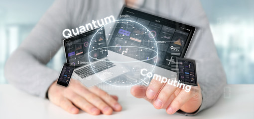 Poster - Businessman holding Quantum computing concept with qubit and devices 3d rendering