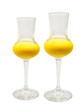 Two glasses of egg liqueur isolated on white background