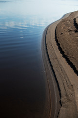 Canvas Print - Sand beach. curved coastline