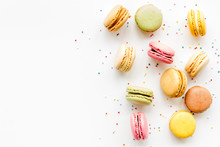 Macarons design on white background top view space for text