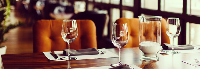 Empty glasses set in restaurant