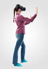 Poster - Young woman exploring virtual world