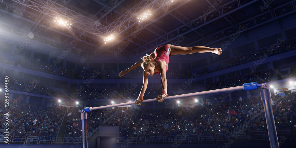 Prone Rocking Stunt Female athlete doing a complicated exciting trick on horizontal ...