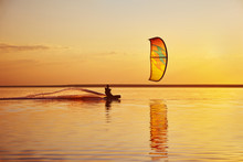 Kitesurfing At Sunset