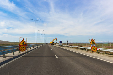 Signs of speed limit in the place of narrowing of the road because of the repair work