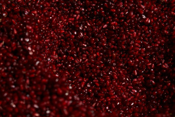 Wall Mural - Close up of fresh organic pomegranate seeds background, top view