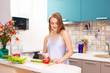 © yuliachupina - beautiful girl making salad in the kitchen