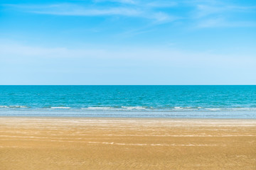 Wall Mural - Abstract beach background. Yellow sand, blue sky